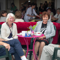 Guests and carers enjoy the tea, cakes and sunshine at the launch of the new CARE Group at Blackpool Carers Centre.