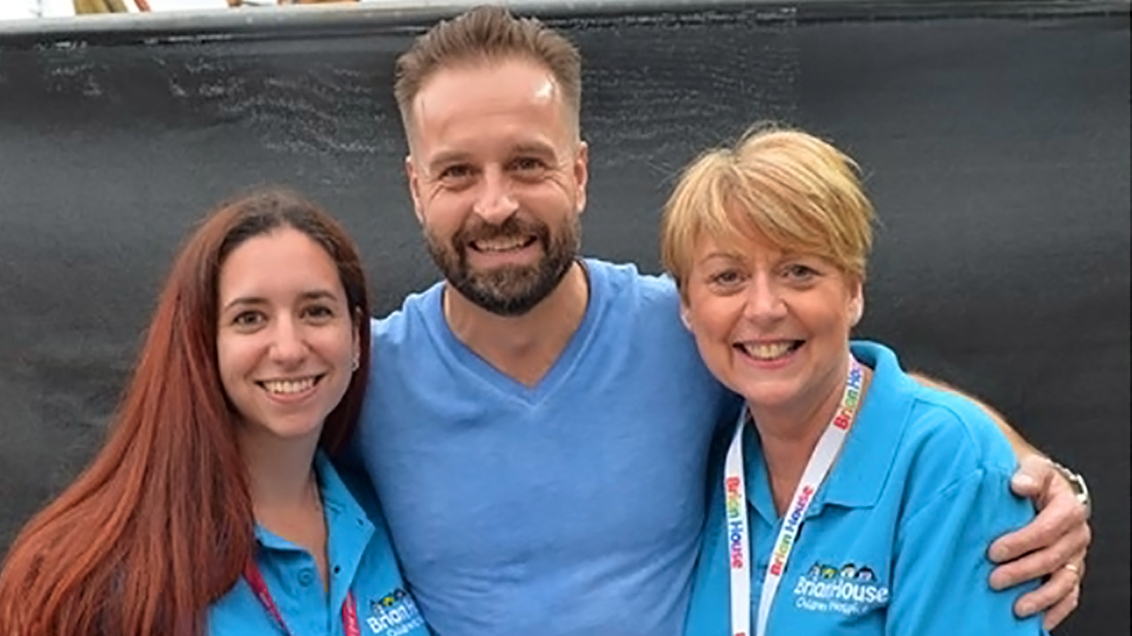 Trinity Hospice Corporate Fundraiser Janet Atkins (right) with Alfie Boe at Alfie’s Homecoming Concert earlier this year. Photo - Darren Nelson