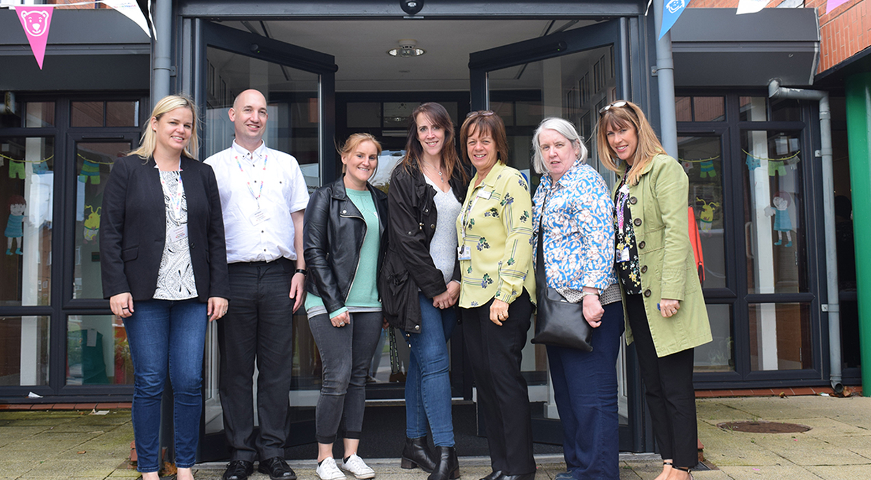 Some of the delegates and speakers at the Too Little Too Late research conference take a tour around Brian House Children’s Hospice, led by clinical manager Carol Wylde (third right).