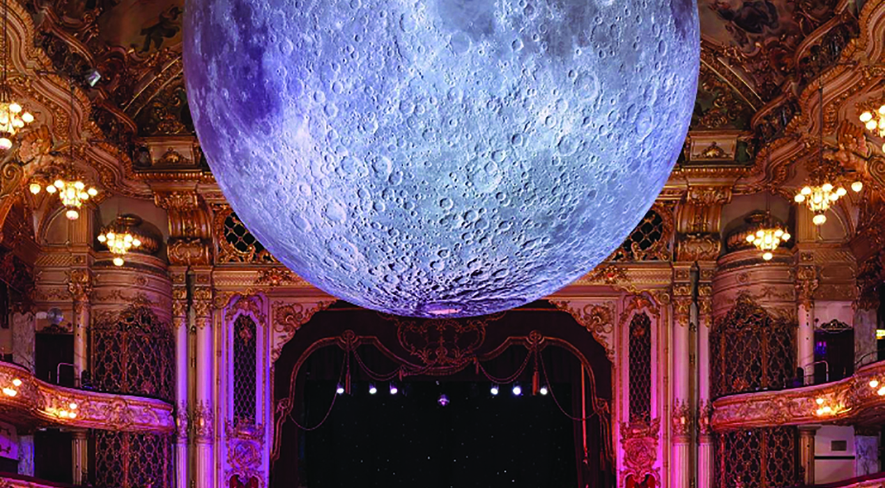The Moon in the Tower Ballroom, adorns the cover of the 2019 resort guide